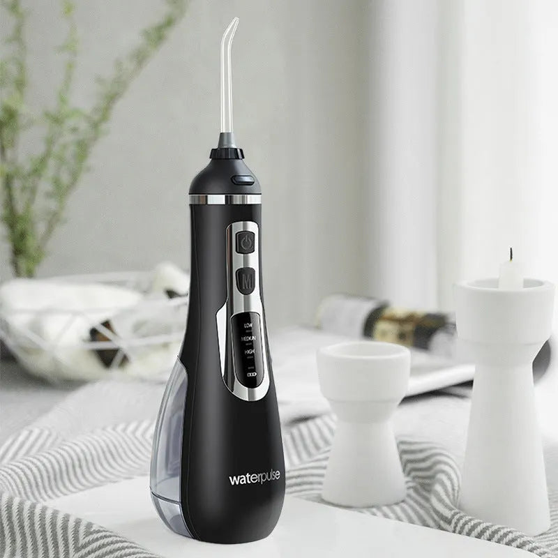 Portable Dental Flusher V500 electric water flosser in white with carrying case