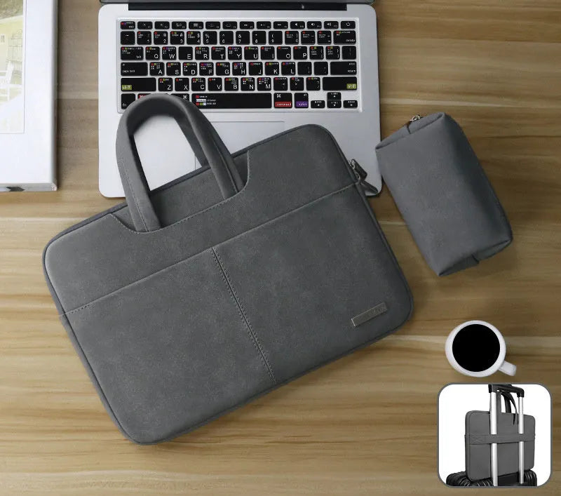Blue water-resistant PU leather laptop sleeve open to show internal organiser pockets for computer, phone and ID.