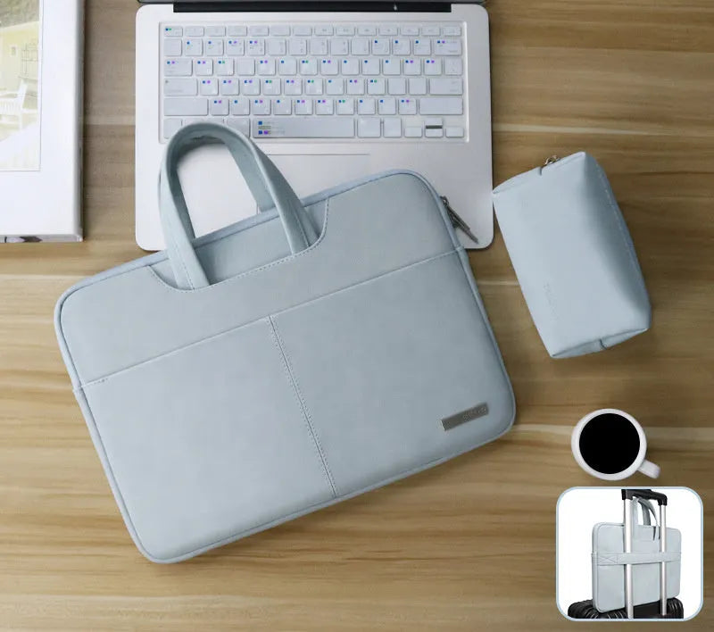 Blue water-resistant PU leather laptop sleeve open to show internal organiser pockets for computer, phone and ID.