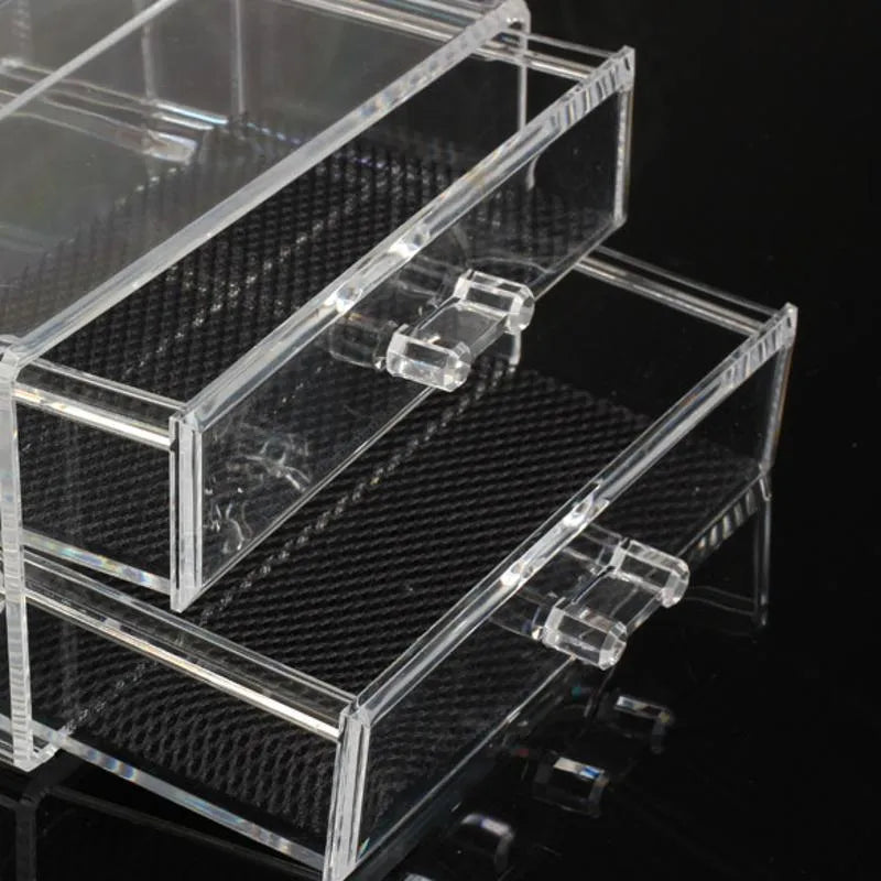 Transparent acrylic makeup storage case showing foldable design and clear material