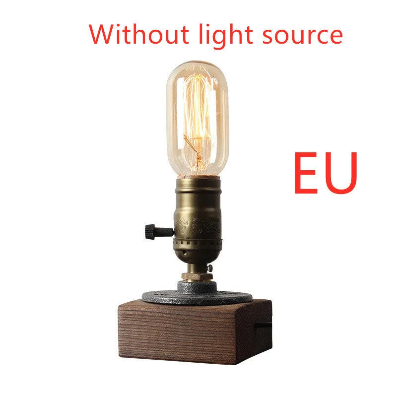 Wood and iron water pipe table lamp measuring 9cm wide by 13cm high with E26/E27 socket