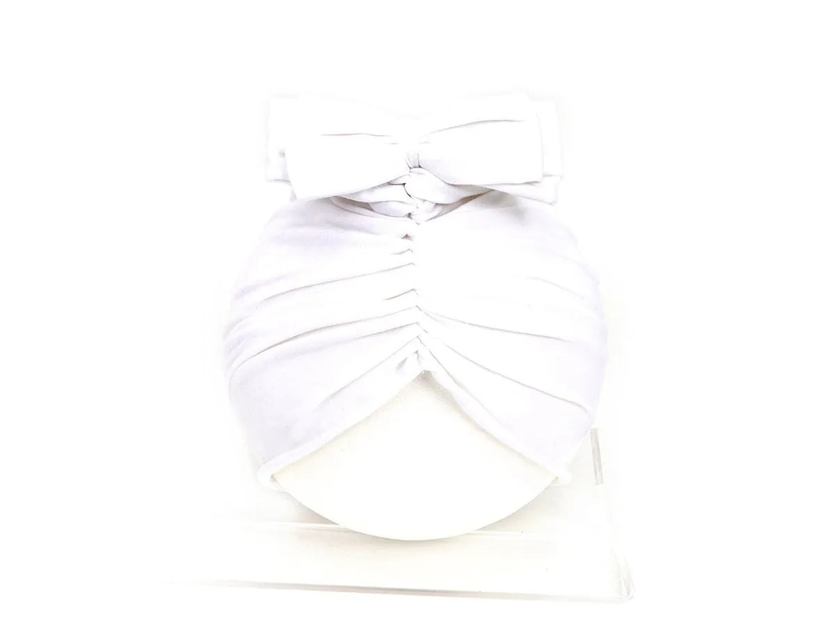 Soft acrylic knitted baby girl turban hat in a solid colour, suitable for newborns to 28 months.
