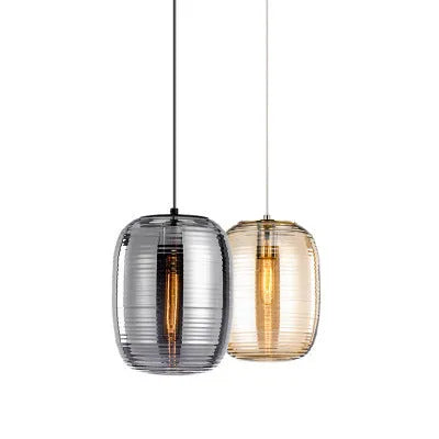 Modern glass table lamp in simple Nordic design, shown in cognac colour with push button switch.