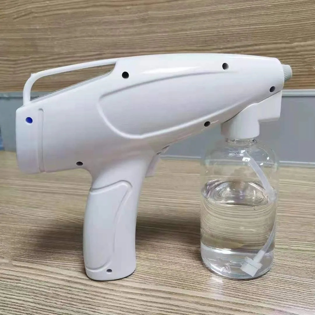 White handheld cordless electric disinfection spray gun with USB charging port