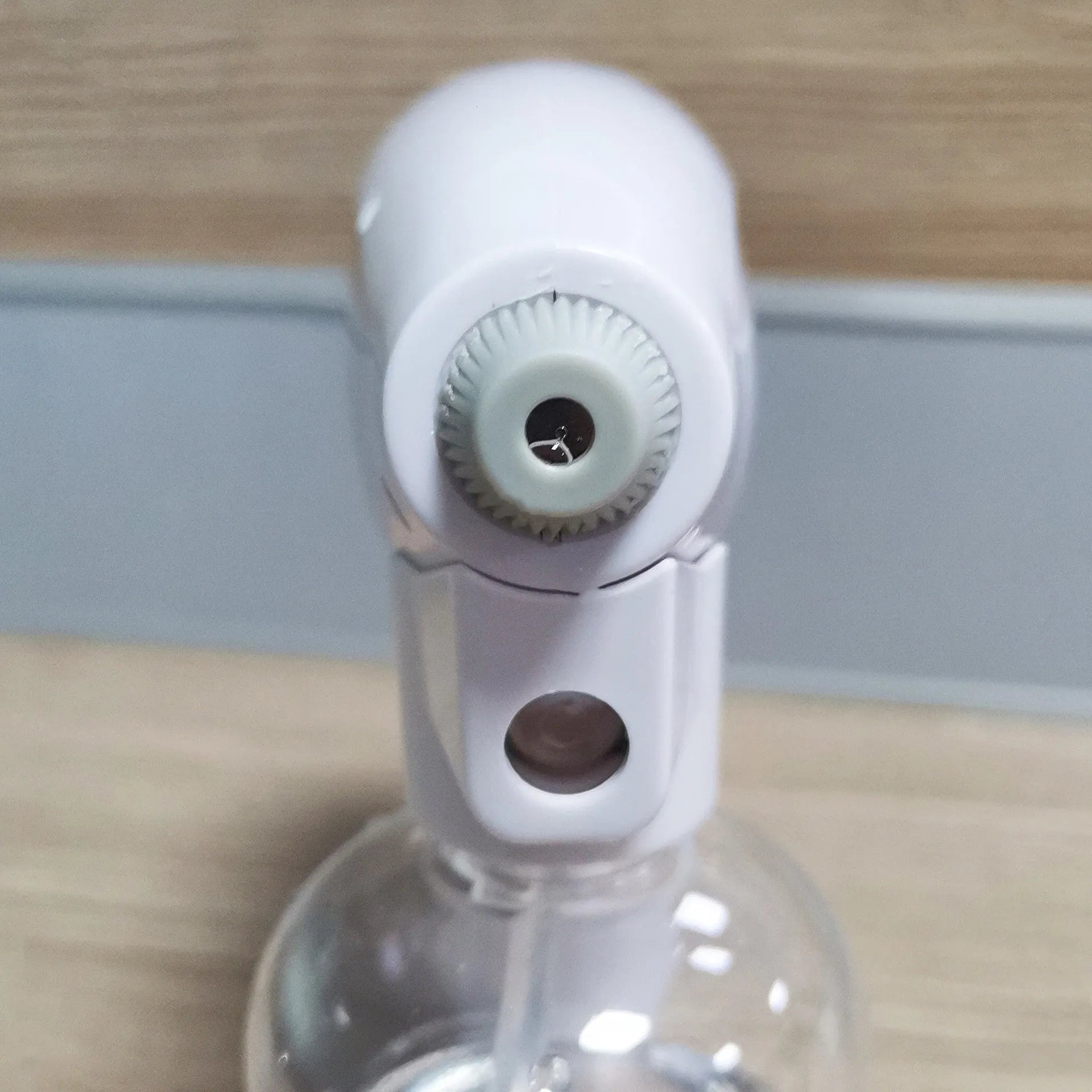 White handheld cordless electric disinfection spray gun with USB charging port