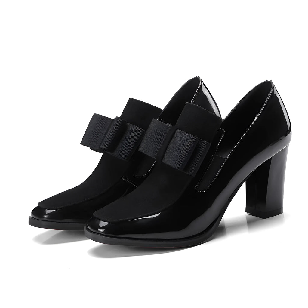 Black patent leather women's high heels with a thick square heel over 8cm high and a square toe.