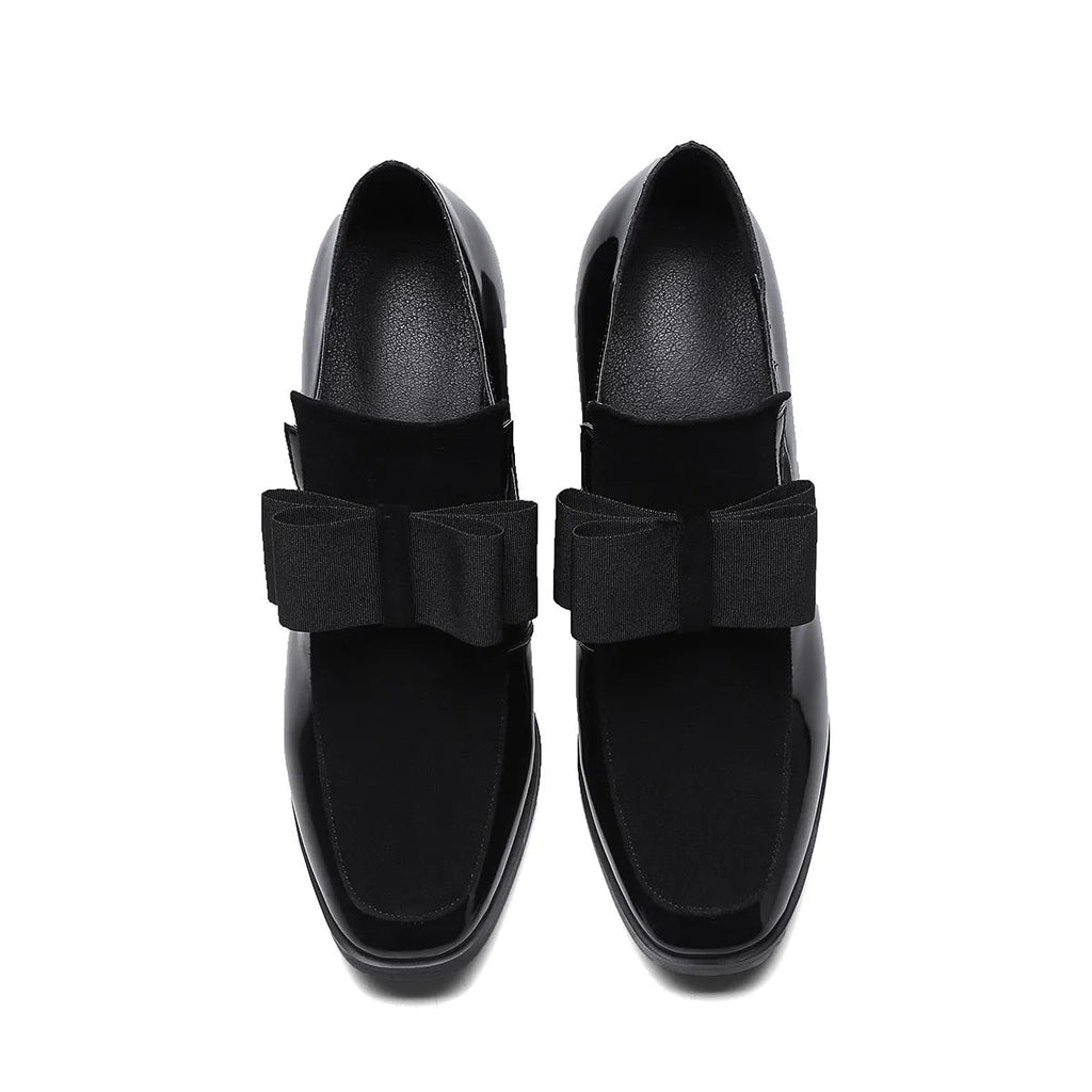 Black patent leather women's high heels with a thick square heel over 8cm high and a square toe.