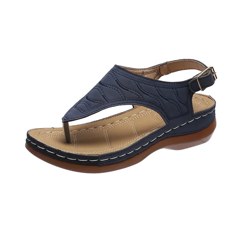 Women's casual wedge heel flip flop sandals with an adjustable back strap in solid colours.