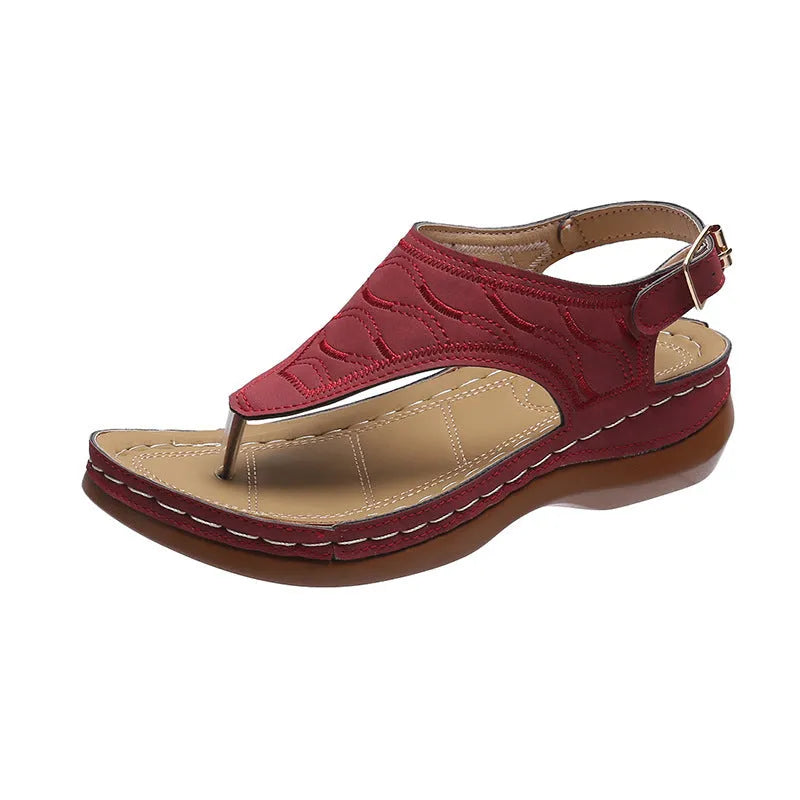 Women's casual wedge heel flip flop sandals with an adjustable back strap in solid colours.