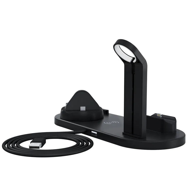 Black three-in-one wireless charging station holding an Apple Watch, AirPods case, and an iPhone on a desk.