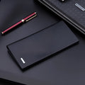 Men's long wallet in black with colour contrast detailing and hidden compartment