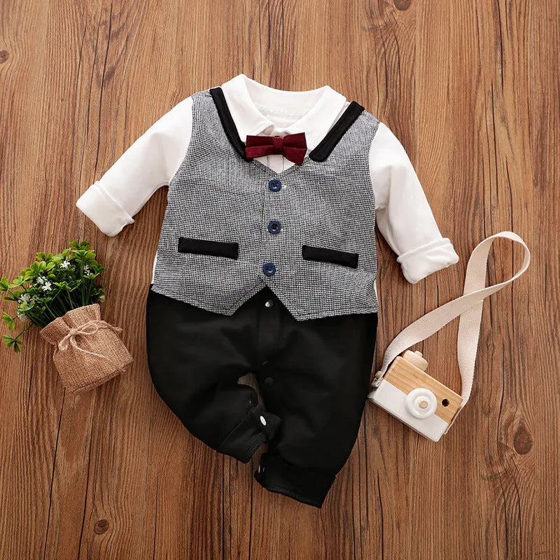Baby boy wearing cotton gentleman-style jumpsuit in navy blue with long sleeves for spring or autumn