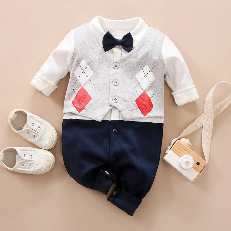 Baby boy wearing cotton gentleman-style jumpsuit in navy blue with long sleeves for spring or autumn