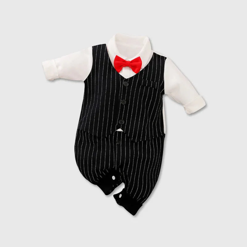 Baby boy wearing cotton gentleman-style jumpsuit in navy blue with long sleeves for spring or autumn