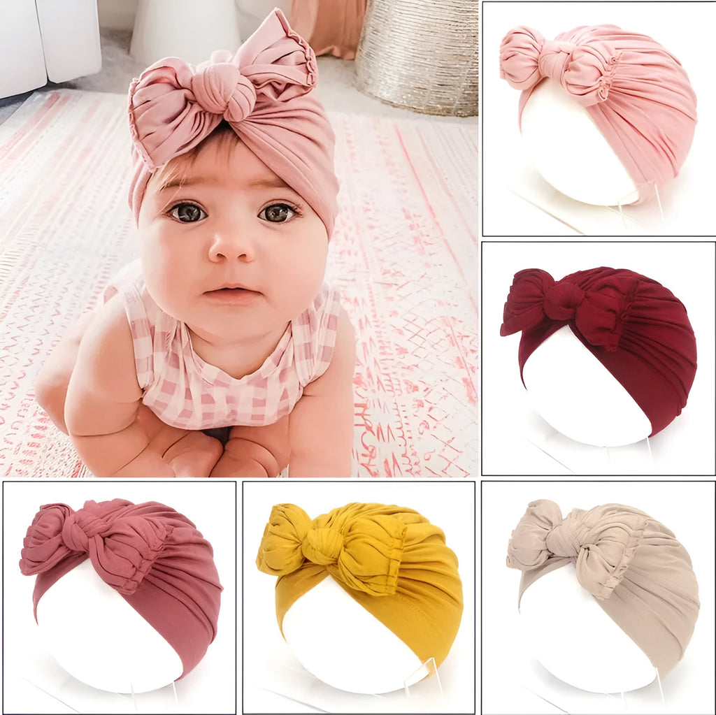 Soft acrylic knitted baby girl turban hat in a solid colour, suitable for newborns to 28 months.