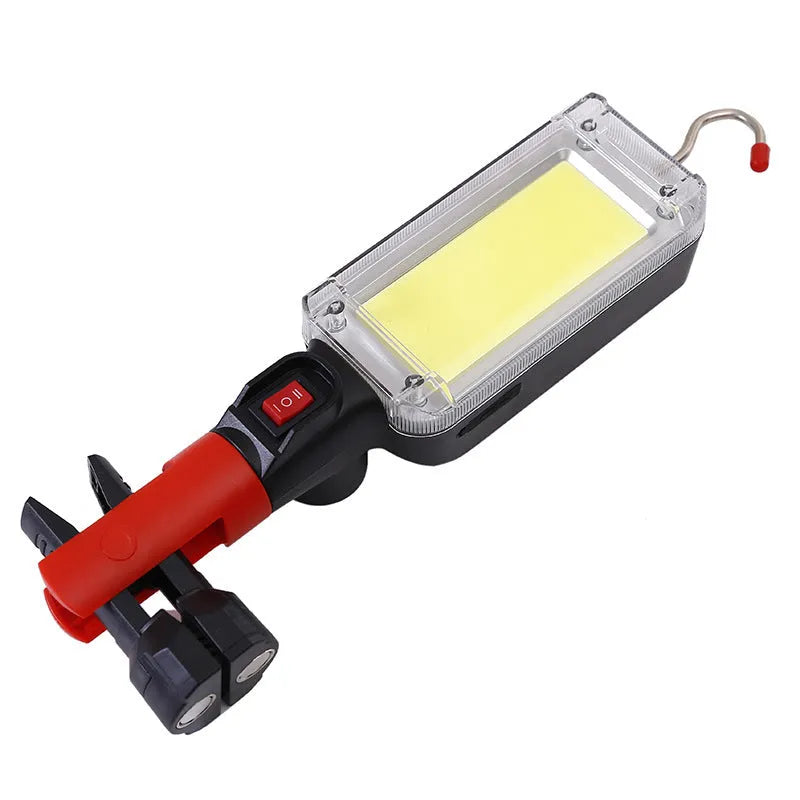 Red portable work light with magnetic hook and USB charging port, measuring 28.8cm long