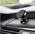 Magnetic car air outlet phone bracket in black attached to a vehicle vent