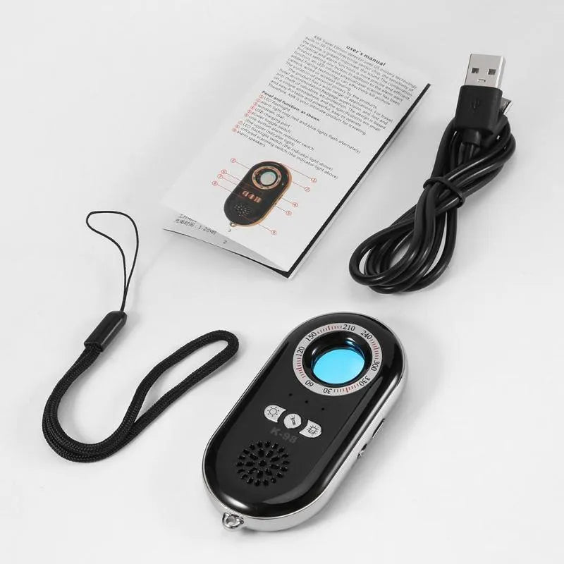 Compact black wireless signal detector with vibration alarm for travel security
