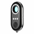 Compact black wireless signal detector with vibration alarm for travel security