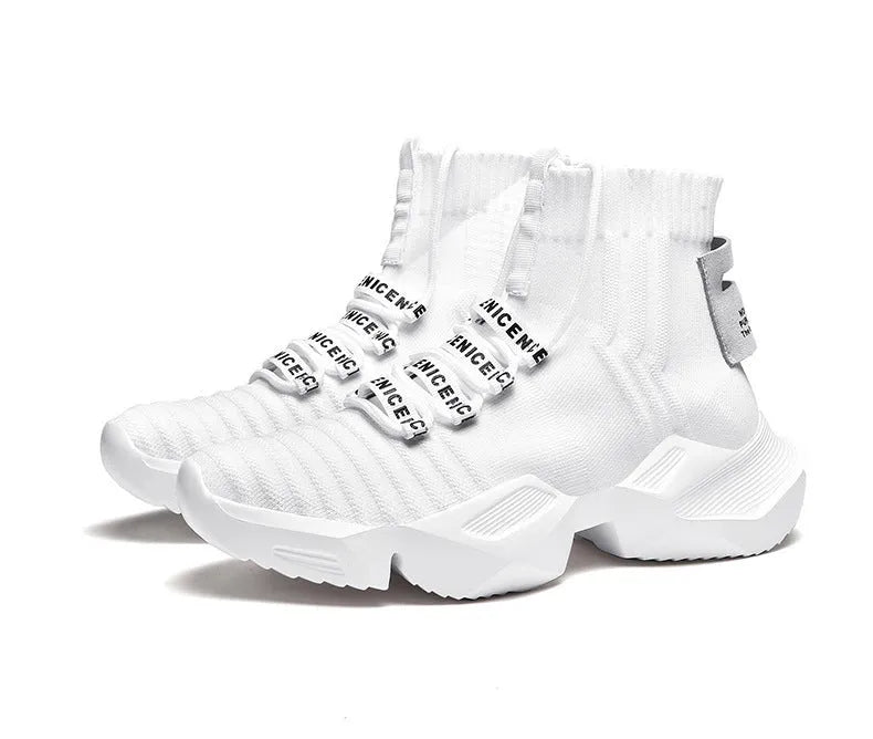 Men's black and white casual sports shoes showing mesh lining and adhesive construction