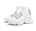 Men's black and white casual sports shoes showing mesh lining and adhesive construction