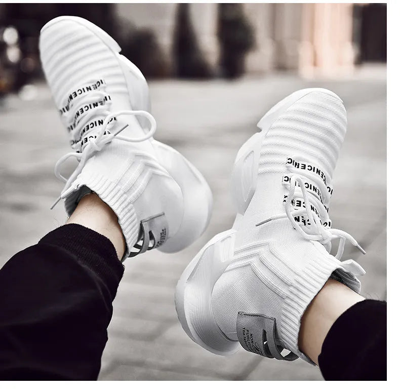 Men's black and white casual sports shoes showing mesh lining and adhesive construction