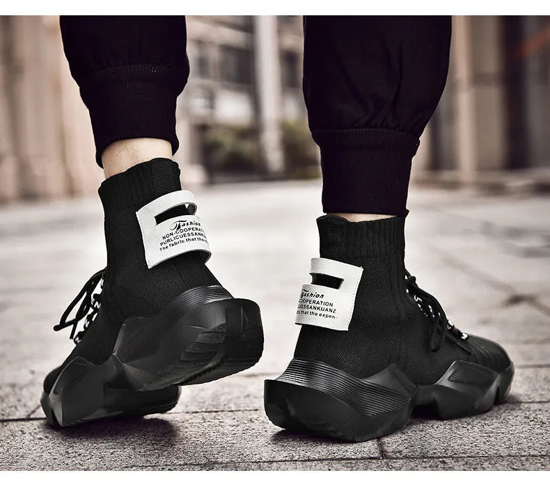 Men's black and white casual sports shoes showing mesh lining and adhesive construction