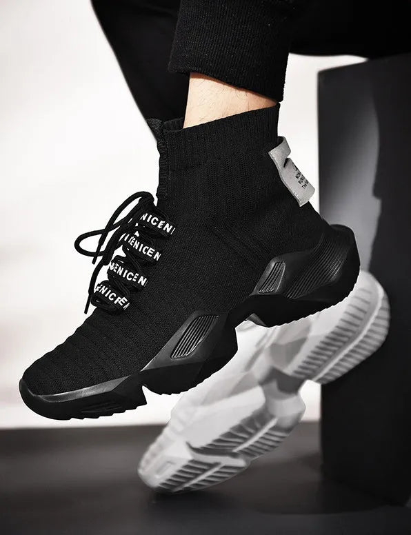 Men's black and white casual sports shoes showing mesh lining and adhesive construction