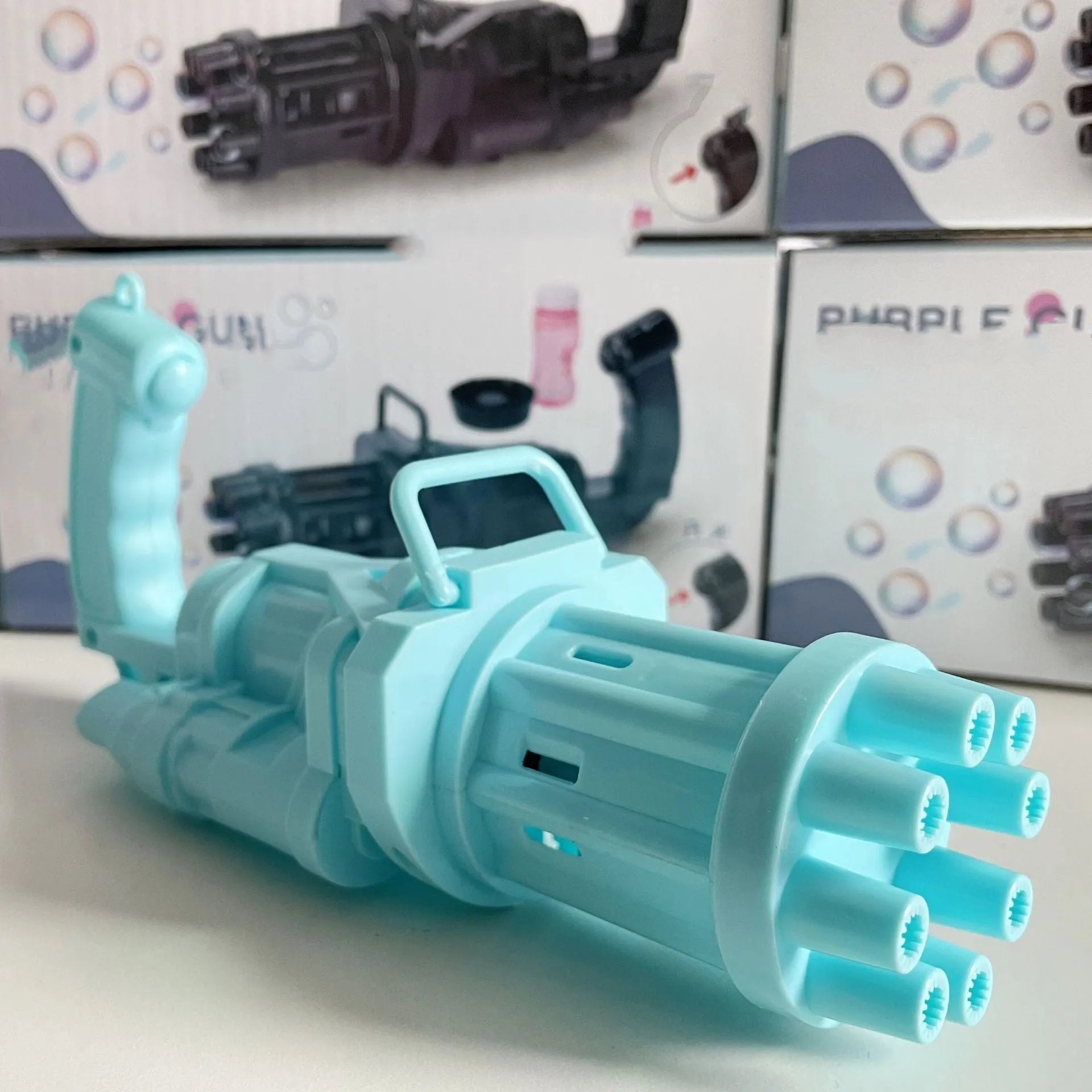 Kids plastic bubble machine gun toy in pink, gold, or black with battery compartment and removable bubble head.