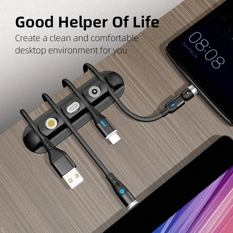 Black soft plastic desktop magnetic data cable organiser for charging station organisation