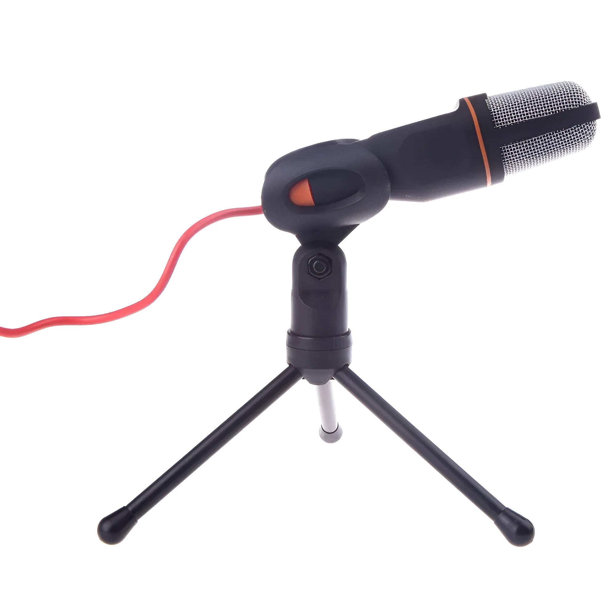 Black wired PC microphone with a long cable and a detached metal clip holder on a desk.