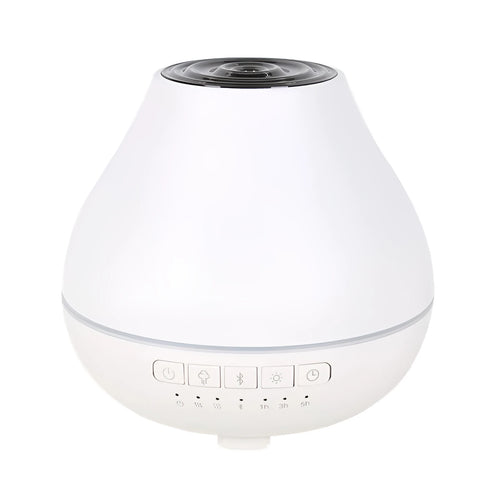 Round white Bluetooth humidifier and aroma diffuser with night light on a surface.