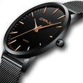 Men's casual quartz watch with alloy case and multiple strap colour options including black mesh and leather.