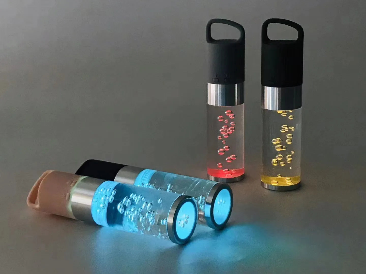 Pink portable Bluetooth speaker with colourful cartoon crystal LED lights on display.