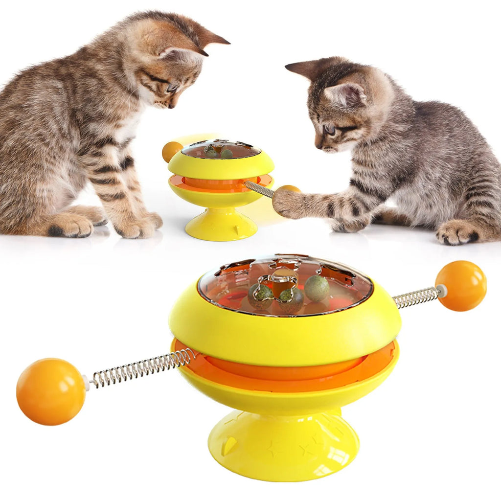 Rotatable cat toy with turntable, three catnip balls, and suction cup base in lake blue colour
