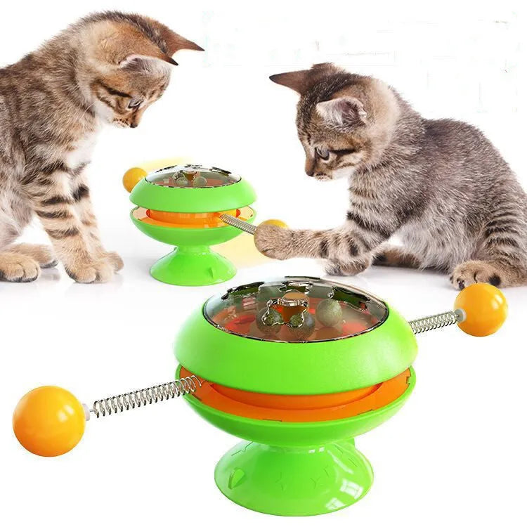 Rotatable cat toy with turntable, three catnip balls, and suction cup base in lake blue colour