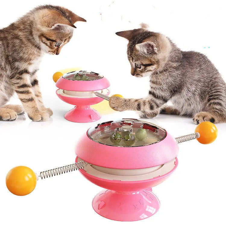 Rotatable cat toy with turntable, three catnip balls, and suction cup base in lake blue colour