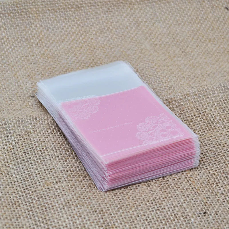 Pink self-adhesive plastic packaging bags for handmade soap with UV printing and adhesive closure