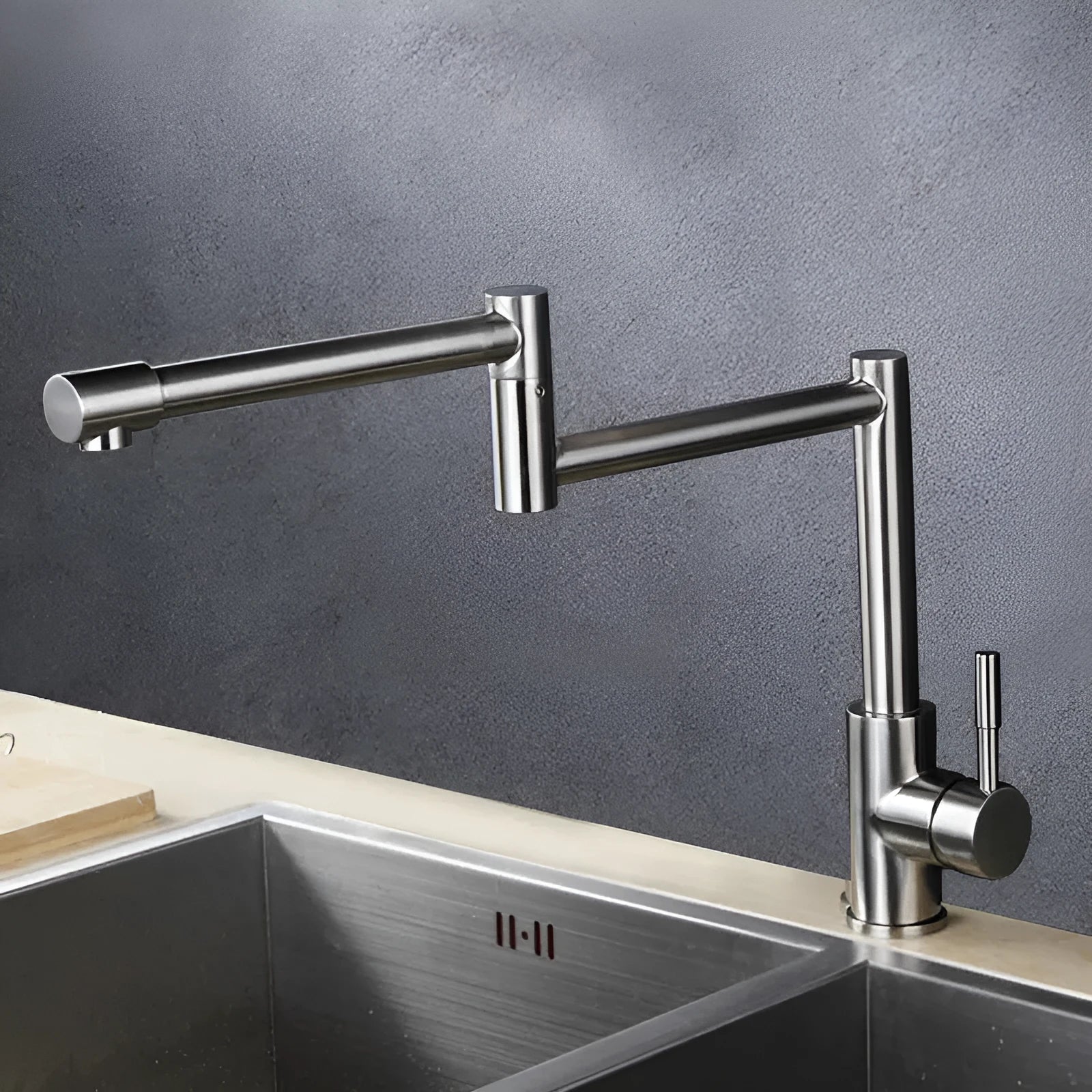 Silver stainless steel mixing tap with 360-degree rotation and lifting mechanism for kitchen or bathroom