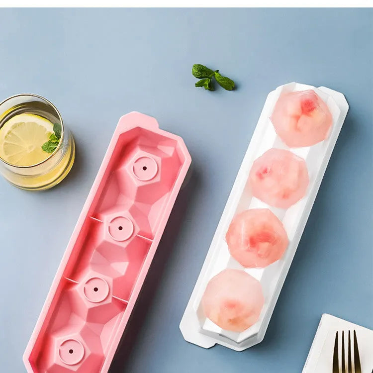 Silicone ice tray showing large ice hockey shape and round ice moulds in assorted colours
