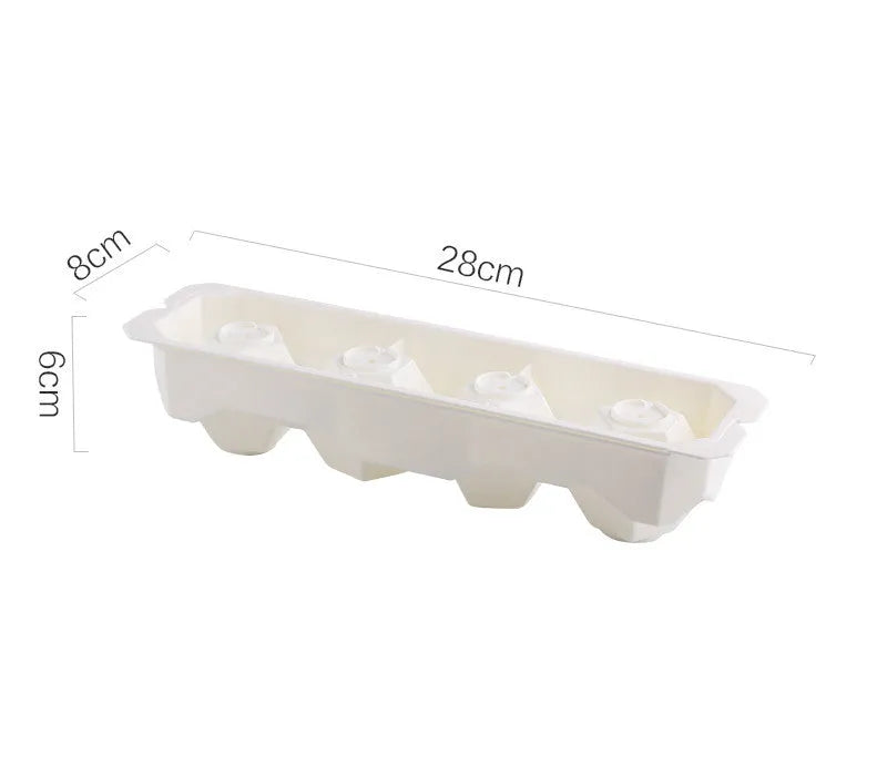 Silicone ice tray showing large ice hockey shape and round ice moulds in assorted colours
