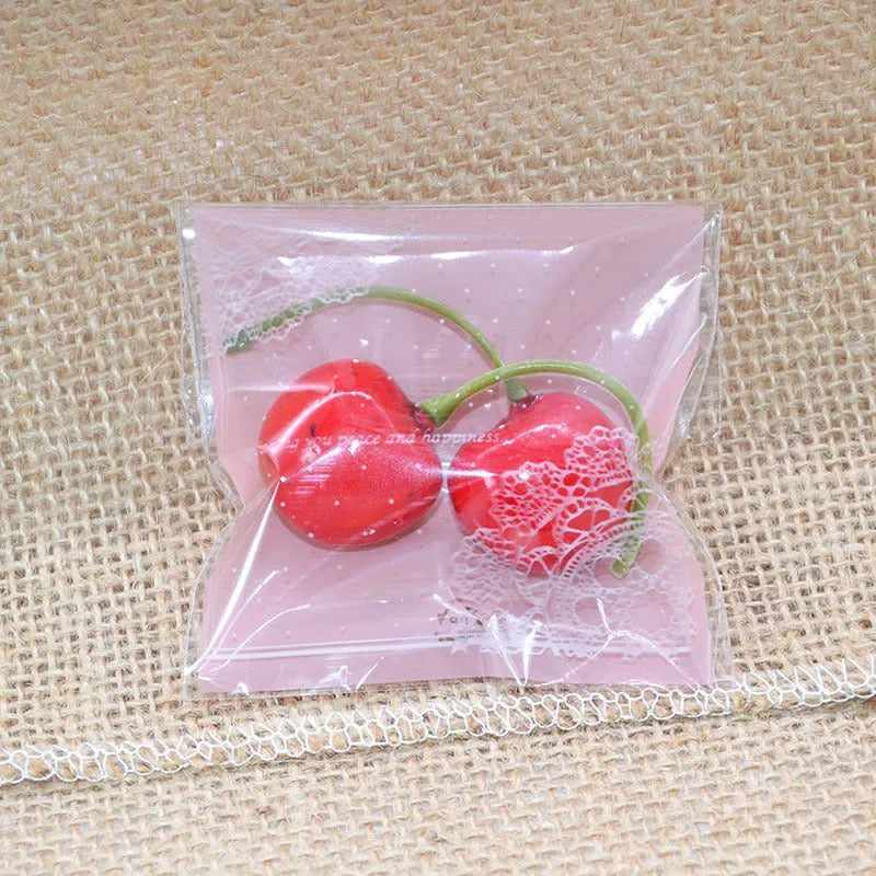 Pink self-adhesive plastic packaging bags for handmade soap with UV printing and adhesive closure