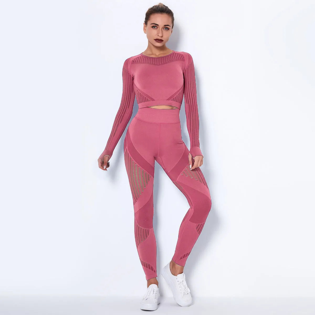 Woman wearing a long-sleeved seamless knitted yoga wearsuit in a stripe pattern, demonstrating a yoga pose.