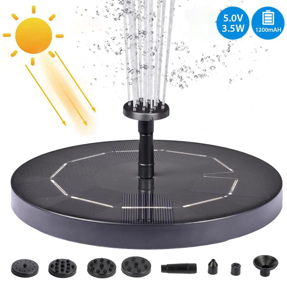 Black solar-powered floating fountain pump with four spray nozzles on a solar panel for garden ponds