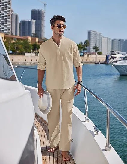 Men's casual cotton suit set in a solid colour, featuring a long-sleeved top and matching trousers.