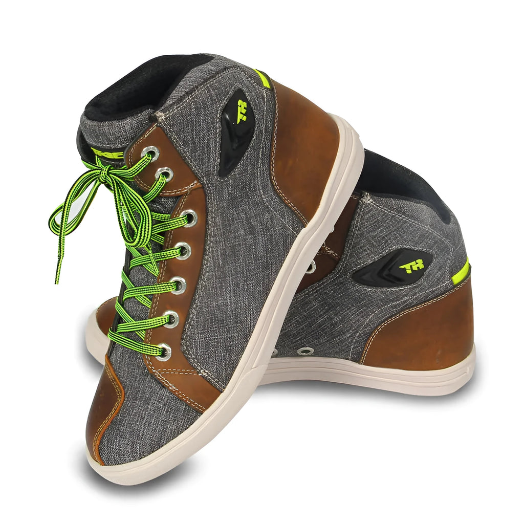 Black and grey motorcycle riding shoes showing casual short boot design with anti-slip soles