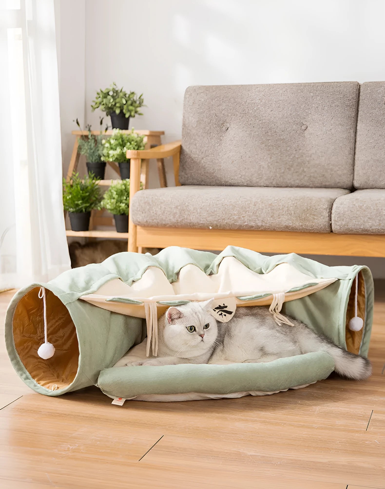 A collapsible cloth cat tunnel in Bar colour, showing its arched shape and dimensions for feline play.