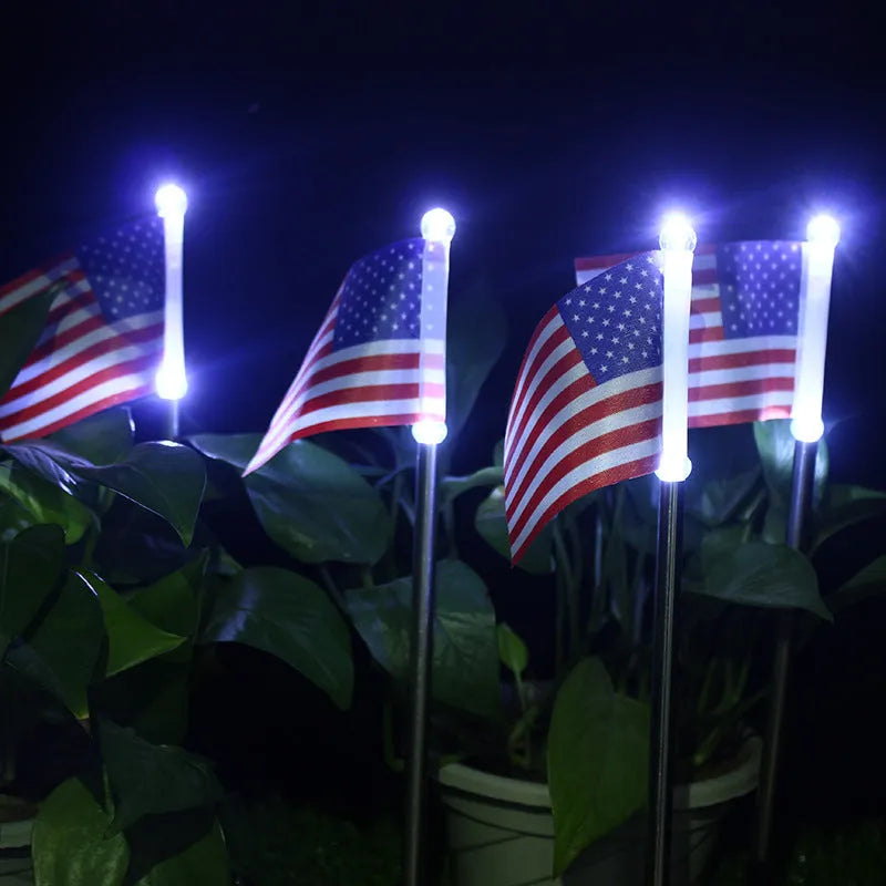 Solar-powered garden flag light with stainless steel frame showing American flag design