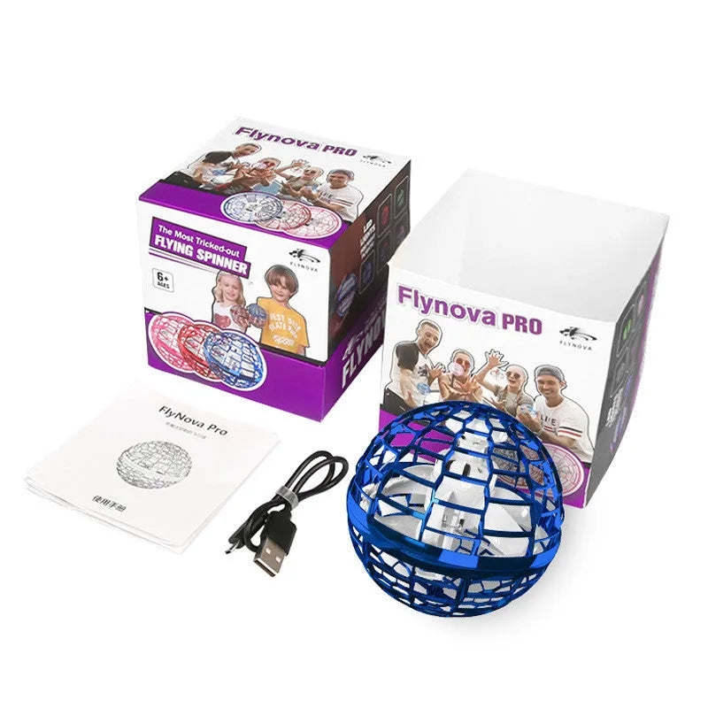 Blue spinning flying ball toy with LED lights hovering above a child's hand next to a magic wand.