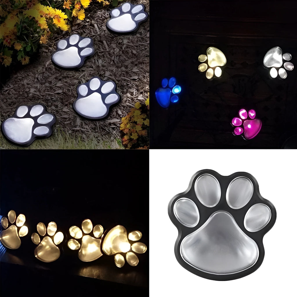 Black solar powered animal paw print LED garden lights set of four with solar panel pole